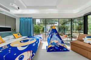 Ένα ή περισσότερα κρεβάτια σε δωμάτιο στο Qingshan Hotel Baotou