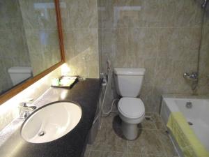 Koupelna v ubytování Sammy Hotel