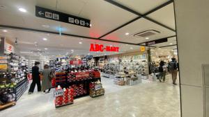 a store with people walking inside of a shopping mall at THE CAMILLE PLACE Tokyo Edogawa has direct access to Akihabara and Shinjuku, with convenient transportation and free WiFi in Tokyo