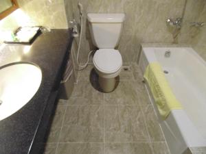 Koupelna v ubytování Sammy Hotel