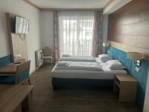 Postel nebo postele na pokoji v ubytování Attergau Rooms - Self Check-In