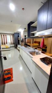 Η κουζίνα ή μικρή κουζίνα στο NAGOYA MANSION & Residence