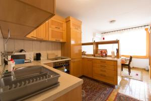 Kuchyň nebo kuchyňský kout v ubytování Apartment Air