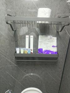 a shelf above a toilet in a bathroom at ماكامايا Makamaya in Al Baha +75 photos
