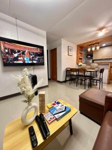 a living room with a couch and a table at House in Davao in Davao City