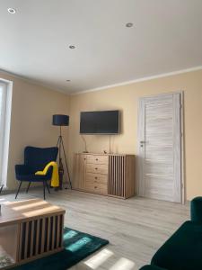Μια τηλεόραση ή/και κέντρο ψυχαγωγίας στο Apartament Koszarawa +19 φωτογραφίες