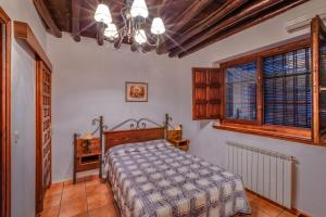 Posteľ alebo postele v izbe v ubytovaní Hotel Rural Huerta del Laurel