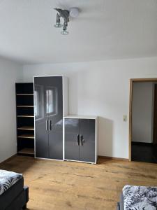 Ένα ή περισσότερα κρεβάτια σε δωμάτιο στο Moderne großzügige Wohnung zu vermieten