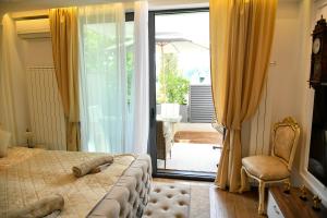 Una cama o camas en una habitación de Residence LUX