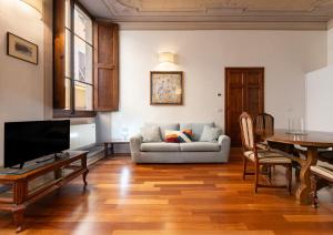 Televisyen dan/atau pusat hiburan di Firenze Rentals - Piazza Signoria