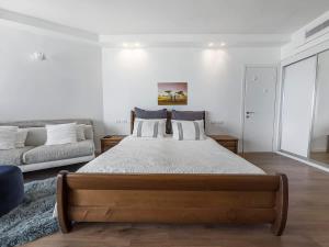 Katil atau katil-katil dalam bilik di The Sharon Sunset Loft +10 gambar