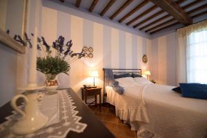 Ein Bett oder Betten in einem Zimmer der Unterkunft Casa Lari