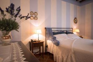 Ein Bett oder Betten in einem Zimmer der Unterkunft Casa Lari