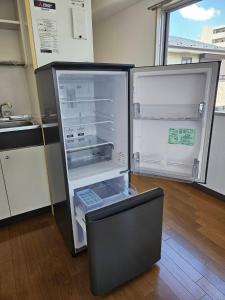 Køkken eller tekøkken på ホテルレスポワール402