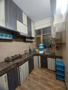 Kuchyň nebo kuchyňský kout v ubytování The Nest#9