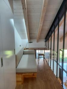 a living room with a couch and a table at Casa Gafura in Barro
