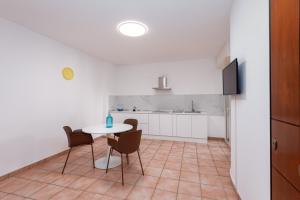 Kuchyň nebo kuchyňský kout v ubytování BG apartment