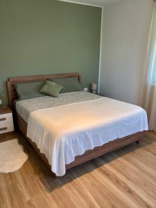 Ένα ή περισσότερα κρεβάτια σε δωμάτιο στο Riki House Selvino