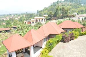 an overhead view of a house with orange roofs at HOLY LAND RESORT Rw in Ruhengeri