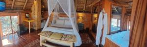 a bedroom in a bus with a bed in it at Lethabo Estate in Lanseria +63 photos