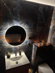 Ванная комната в Szmer Olzy Apartament