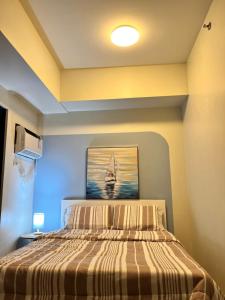 Postel nebo postele na pokoji v ubytování The Median 1209 + 17 fotografií