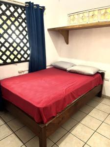 Ένα ή περισσότερα κρεβάτια σε δωμάτιο στο Casita en la playa +2 φωτογραφίες