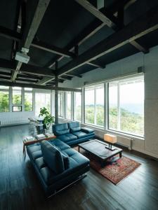 Posezení v ubytování ASNOVA RESORT 空の家ガーデンHotel
