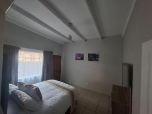 Postel nebo postele na pokoji v ubytování Mountain View Self-Catering Accommodation