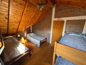 Postel nebo postele na pokoji v ubytování La Hormiga