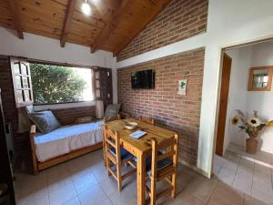 TV a/nebo společenská místnost v ubytování La Hormiga