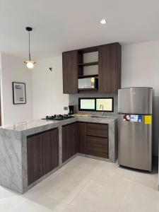 Kuchyň nebo kuchyňský kout v ubytování Modern apartment near to the international airport