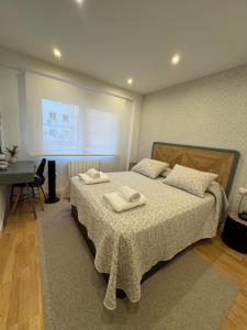 En eller flere senge i et værelse på Aires de Pontevedra