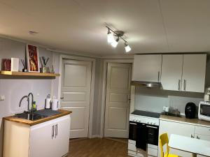 Η κουζίνα ή μικρή κουζίνα στο Trondheim, Kroppanmarka Tiller +8 φωτογραφίες