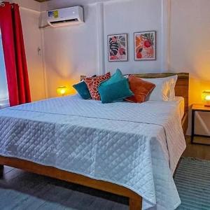 En eller flere senge i et værelse på Casa Selva Viva