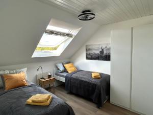 Postel nebo postele na pokoji v ubytování FR- moderne Wohnung, WLAN, Smart-TV, voll ausgestattete Küche