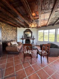 Χώρος καθιστικού στο Casa Des Mille Collines