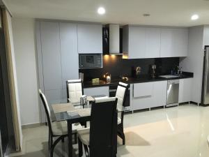Kuchyň nebo kuchyňský kout v ubytování Cartagena Beach Front