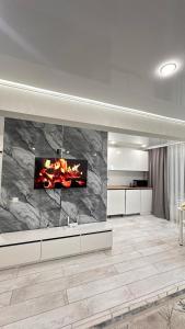 Køkken eller tekøkken på Квартира на Протозанова