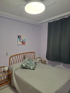 En eller flere senge i et værelse på Magic World