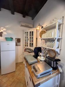 Kuchyň nebo kuchyňský kout v ubytování Casa Vacanze Bombolino