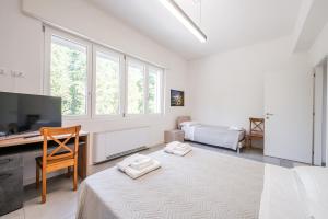 Postel nebo postele na pokoji v ubytování Rivazza Apartment - Free WiFi, Air Conditioning & Private Parking