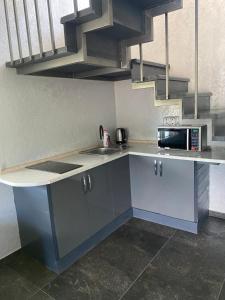 Kuchyň nebo kuchyňský kout v ubytování Guta House