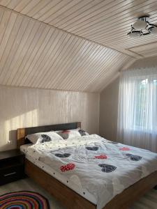 Postel nebo postele na pokoji v ubytování Guta House