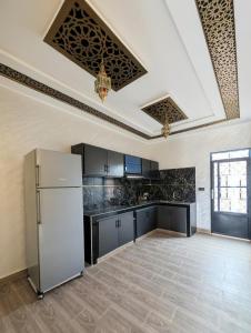 Η κουζίνα ή μικρή κουζίνα στο Luxury Merzouga Appartement