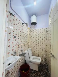 Et badeværelse på Balajiresidency Lodge