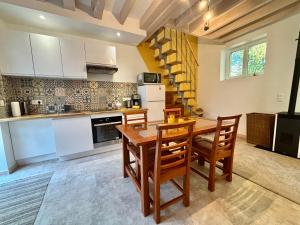 Η κουζίνα ή μικρή κουζίνα στο Quiet Cottage Disneyland Paris - Rentaway BnB +16 φωτογραφίες