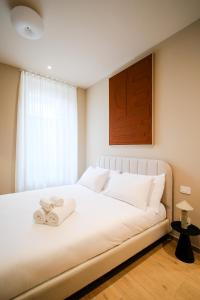 Ένα ή περισσότερα κρεβάτια σε δωμάτιο στο Balcony Studio Double Suite - Bernina Experience +1 φωτογραφίες