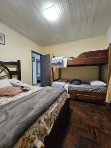 Postel nebo postele na pokoji v ubytování Casa Frente Mar - Penha - 5km do Beto Carrero