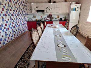 Η κουζίνα ή μικρή κουζίνα στο Aihan guest house
